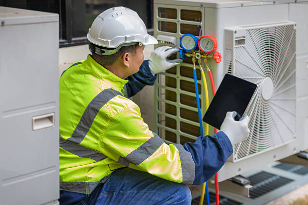 Professional Air Conditioning Repair technician working in Camden, OH